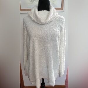 Sojo cowl neck sweater with sleeves that slender at the wrist